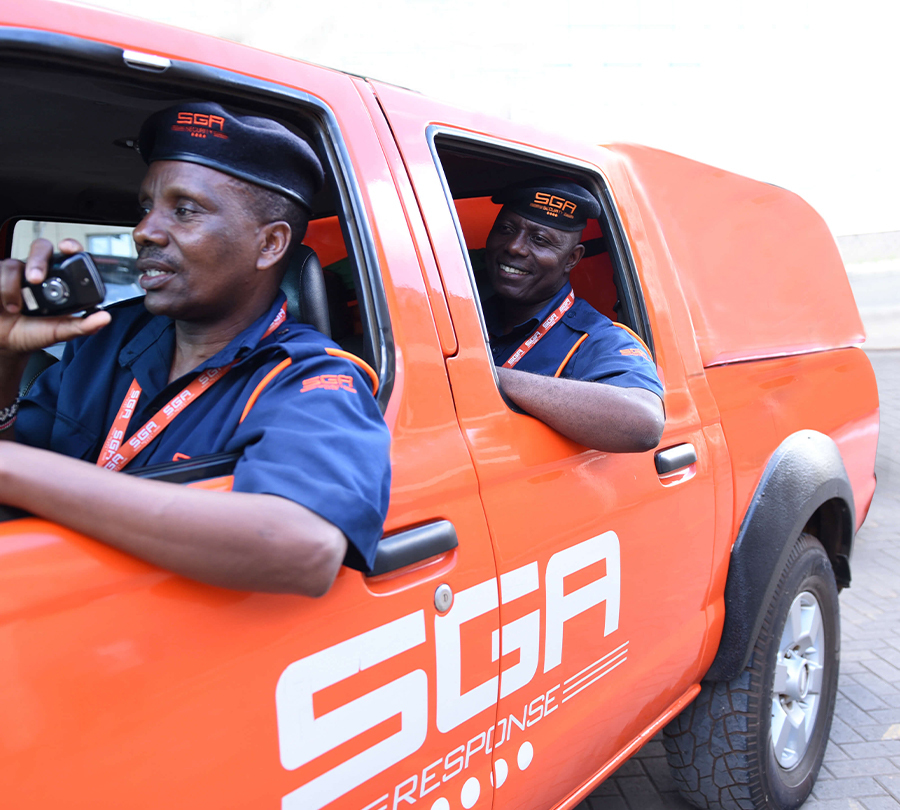 Several SGA Security vehicles parked